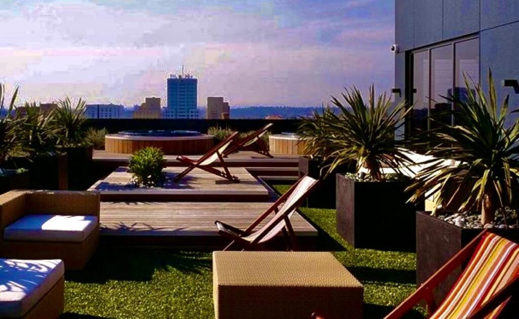Rooftop terrace with artificial turf and planters